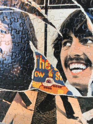 Beatles Multi-Color Puzzle Piece Framed Art