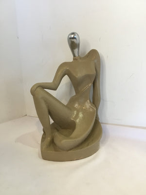 Tan Cement Woman Figurine