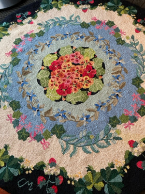 Round Wool Floral Rug