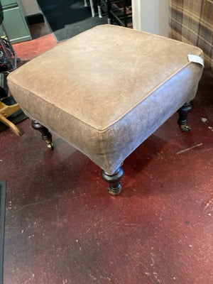 Brown Leather On Wheels FootStool/Ottoman