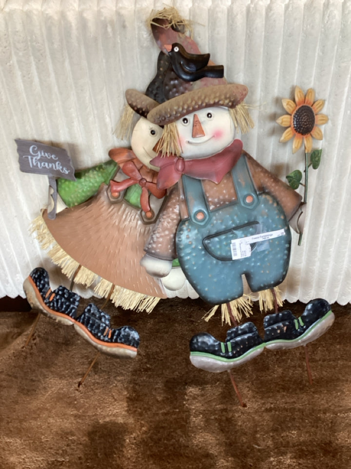 Pair Orange/Gray Metal Scarecrow Garden Access.