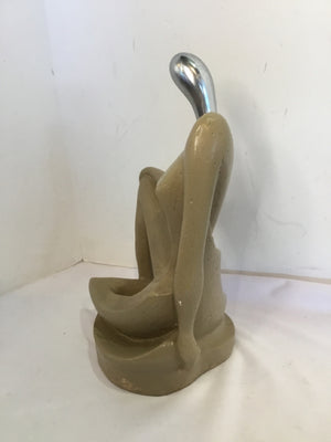 Tan Cement Woman Figurine