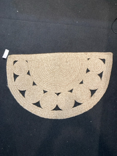 1/2 Round Tan Rug