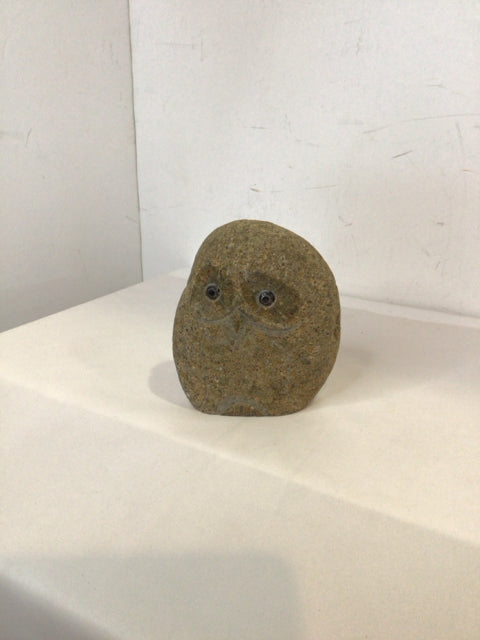 Tan Stone Bird Sculpture