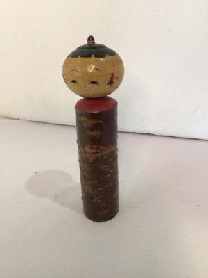 Oriental Red/Tan Wood Doll