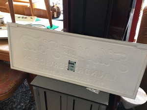 Gray/White Metal Laundry Sign