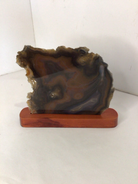 Brown Stone On Stand Statue