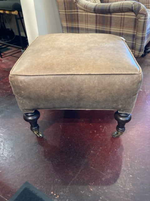 Brown Leather On Wheels FootStool/Ottoman