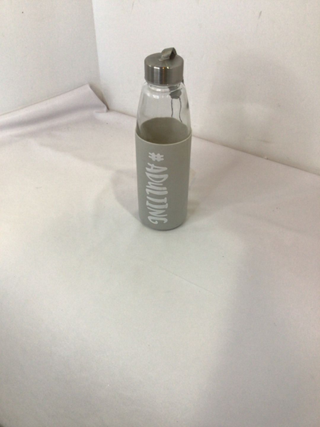 Drinking Gray/White Glass Bottle