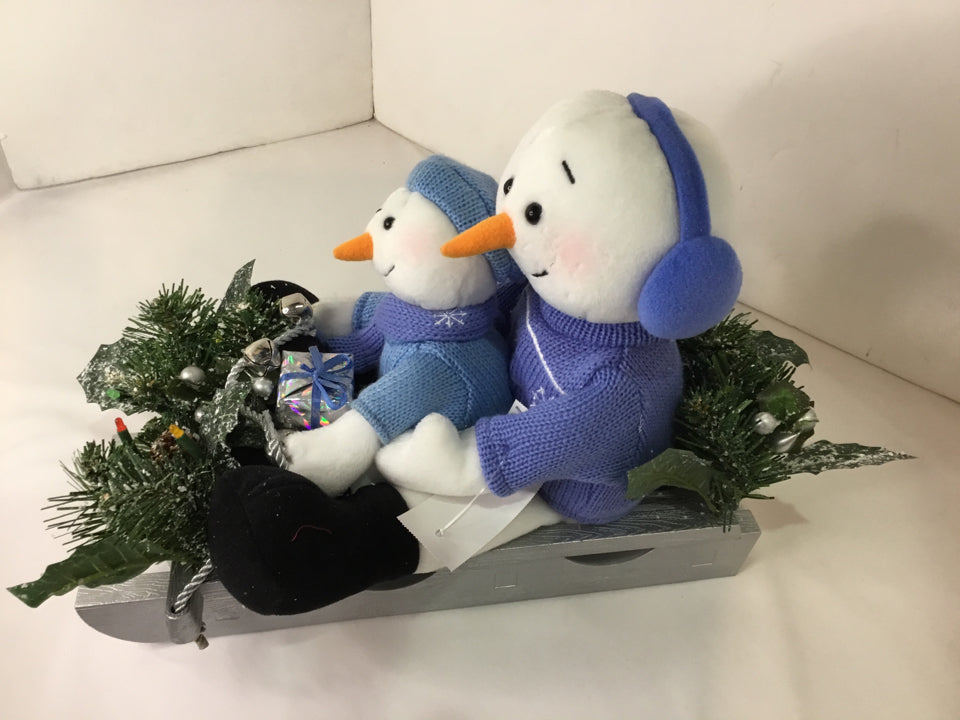 Silver/Blue Sweater Snowman Sled Holiday Item