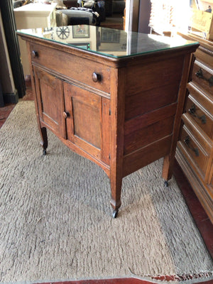 Vintage Brown Wood Glass Top On Casters Cabinet